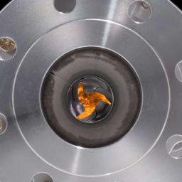 Dilating Disk Valve with flaming background
